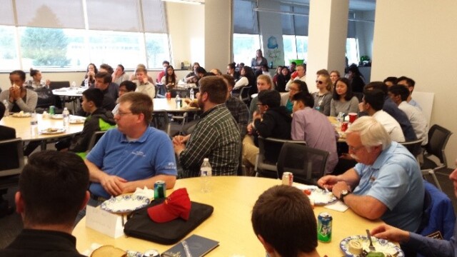 The audience listens intently to Rod Huete's presentation.