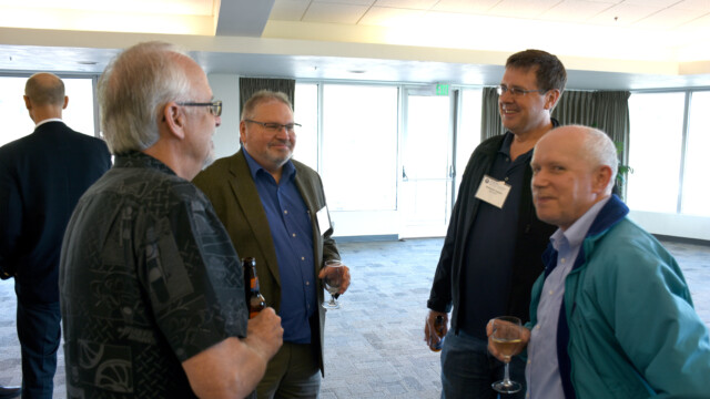 SFTE Members enjoy a cocktail at the reception following the Friday Symposium. From left to right: Bob Armstrong, Mark Malone, Michael Closson, and Mark Wilson.
