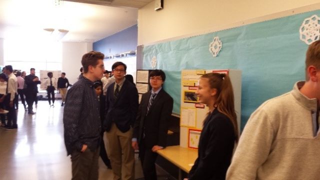 Raisbeck Aviation High School students present their Flight Test projects to SFTE members and attendees of the Annual Outreach Dinner.